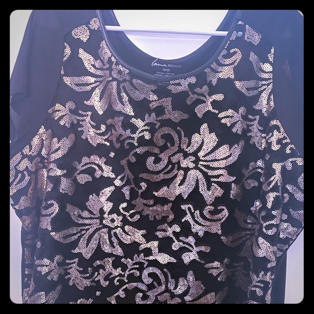 Black gold trim with blouse .